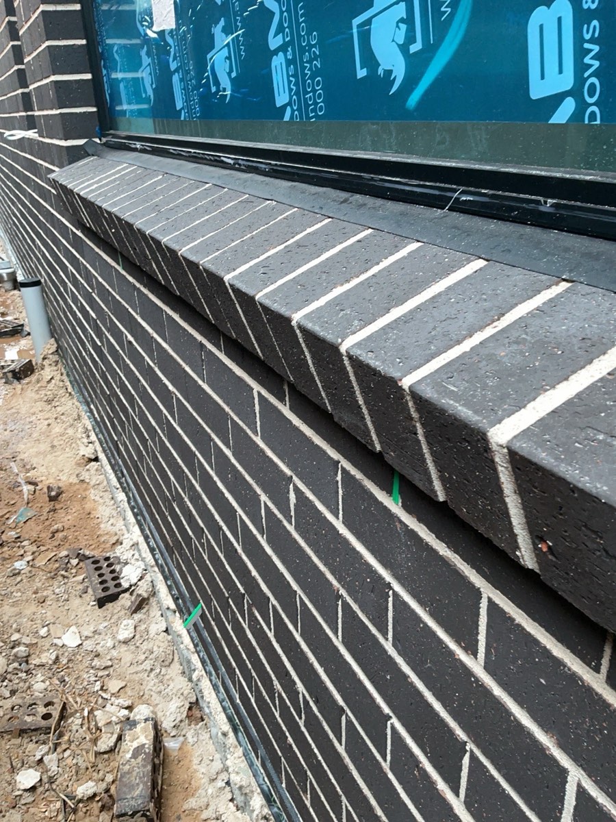Adjust window rubber flashing, recorded during a lock-up inspection in Austral