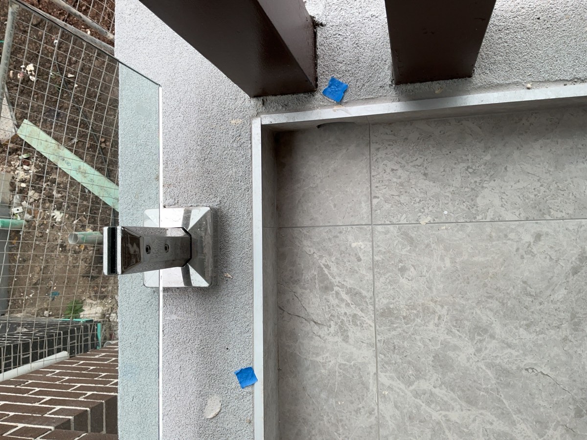 Render damaged or defective, recorded during a handover inspection in Austral