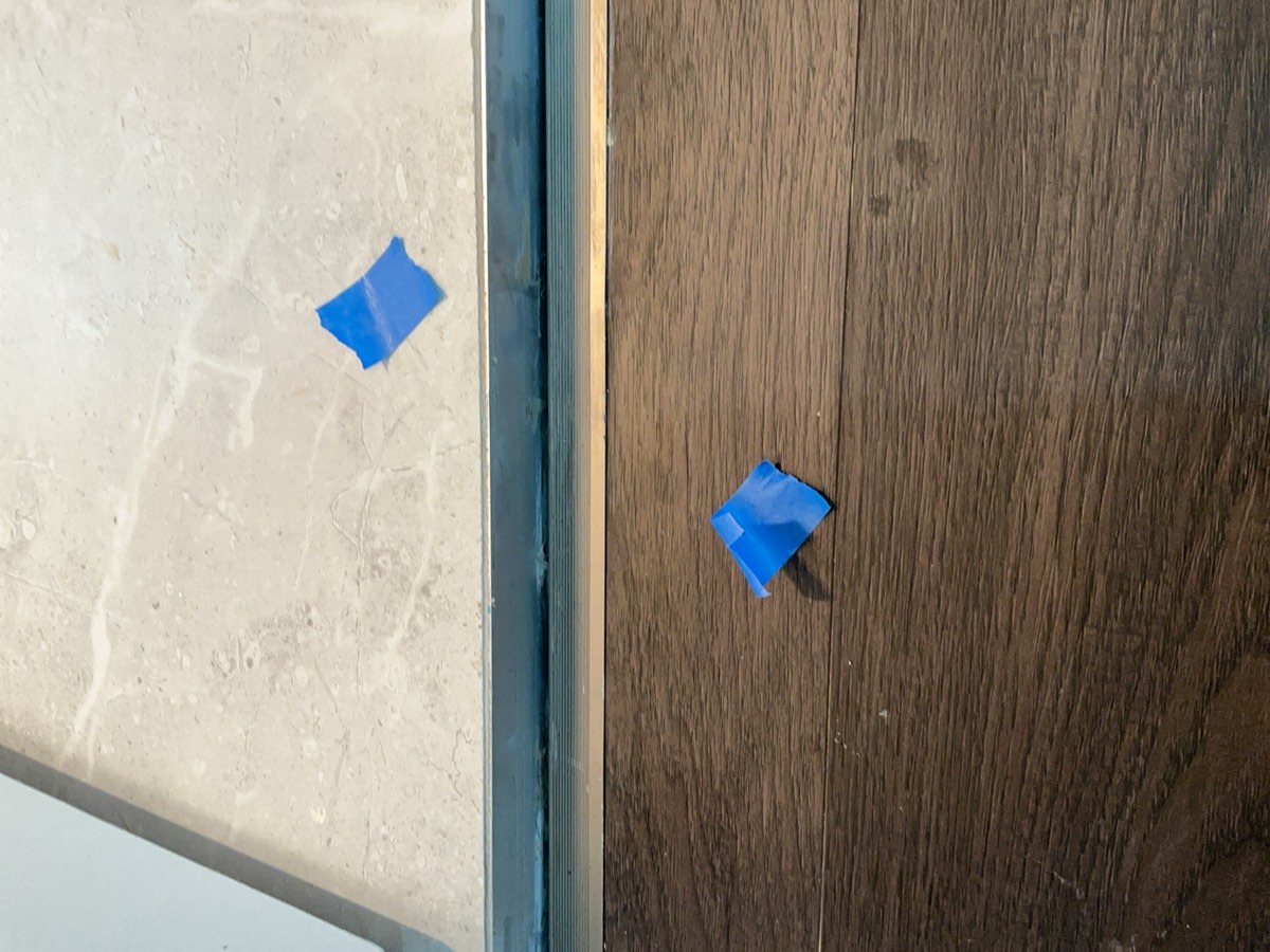 Inadequate sealant, recorded during a handover inspection in Austral