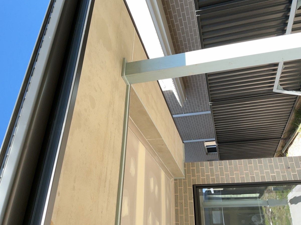Eaves not painted, recorded during a fixing stage inspection in Austral